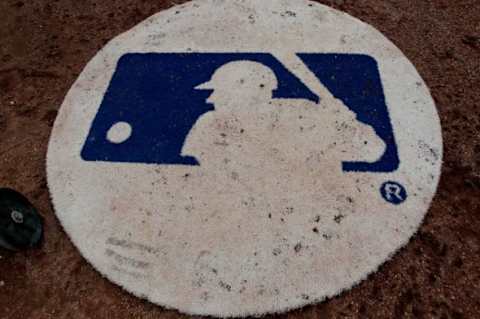 Feb 24, 2013; Dunedin, FL, USA; A detail of a MLB logo on the batters circle during a spring training game between the Toronto Blue Jays and the Baltimore Orioles at Florida Auto Exchange Park. Mandatory Credit: Derick E. Hingle-USA TODAY Sports