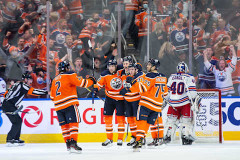 EDMONTON, AB – NOVEMBER 05: Duncan Keith #2, Leon Draisaitl #29, Jesse Puljujarvi #13, Connor McDavid #97 and Evan Bouchard #75 of the Edmonton Oilers celebrate a goal against the New York Rangers during the third period at Rogers Place on November 5, 2021 in Edmonton, Canada. (Photo by Codie McLachlan/Getty Images)