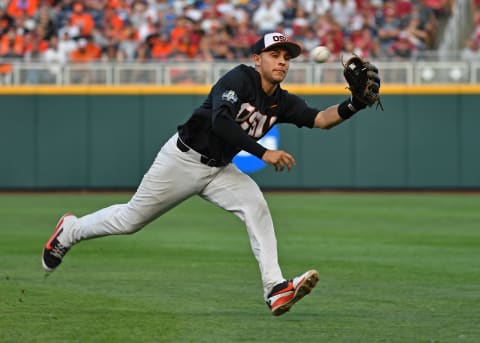 Omaha, NE – JUNE 26: Infielder Nick Madrigal #3 of the Oregon State Beavers chases after a chopper through the infield in the fifth inning against the Arkansas Razorbacks during game one of the College World Series Championship Series on June 26, 2018 at TD Ameritrade Park in Omaha, Nebraska. (Photo by Peter Aiken/Getty Images)