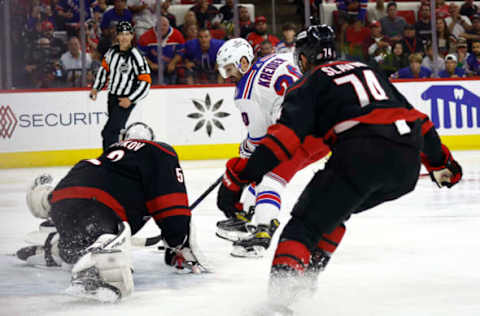 RALEIGH, NORTH CAROLINA – MAY 30: Chris Kreider #20 of the New York Rangers scores a third-period goal against Pyotr Kochetkov #52 of the Carolina Hurricanes in Game Seven of the Second Round of the 2022 Stanley Cup Playoffs at PNC Arena on May 30, 2022, in Raleigh, North Carolina. (Photo by Jared C. Tilton/Getty Images)