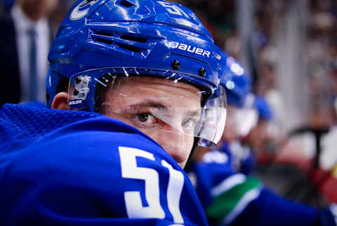 VANCOUVER, BC – MARCH 24: Troy Stecher #51 of the Vancouver Canucks looks on from the bench during their NHL game against the Columbus Blue Jackets at Rogers Arena March 24, 2019 in Vancouver, British Columbia, Canada. (Photo by Jeff Vinnick/NHLI via Getty Images)”n