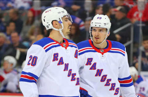 NEWARK, NJ – APRIL 03: New York Rangers left wing Chris Kreider (20) talks with New York Rangers right wing Pavel Buchnevich (89) during the second period of the National Hockey League Game between the New Jersey Devils and the New York Rangers on April 3, 2018, at the Prudential Center in Newark, NJ. (Photo by Rich Graessle/Icon Sportswire via Getty Images)