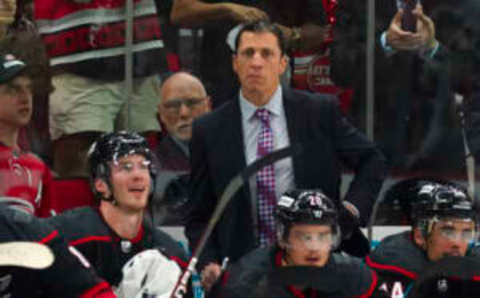 May 14, 2022; Raleigh, North Carolina, USA; Carolina Hurricanes head coach Rod BrindÕAmour looks on from the bench during the third period against the Boston Bruins in game seven of the first round of the 2022 Stanley Cup Playoffs at PNC Arena. Mandatory Credit: James Guillory-USA TODAY Sports