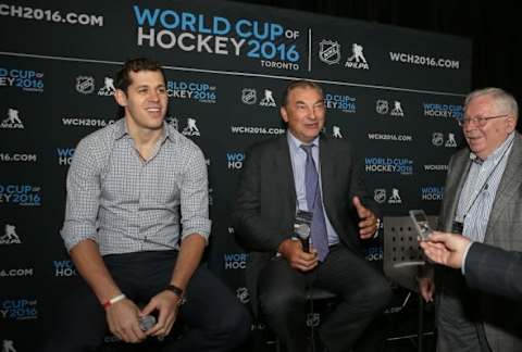 Sep 9, 2015; Toronto, Ontario, Canada; Vladislav Tretiak answers questions from the press as Evgeni Malkin (left) and an interpreter (right) look on during a press conference and media event for the 2016 World Cup of Hockey at Air Canada Centre. Mandatory Credit: Tom Szczerbowski-USA TODAY Sports