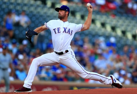 Although Hamels would be a nice addition to any contender, the Rangers want to trade him in early July. Photo by Tom Pennington/Getty Images.