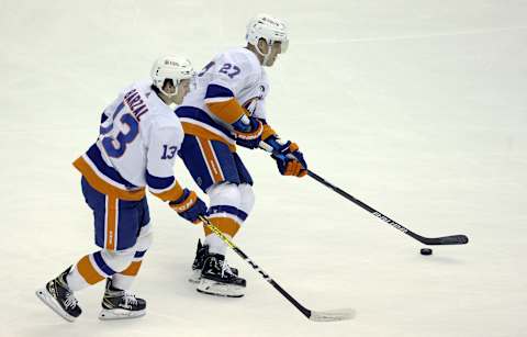 New York Islanders centers Mathew Barzal (13) and Anders Lee (27). Mandatory Credit: Charles LeClaire-USA TODAY Sports