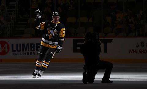 PITTSBURGH, PENNSYLVANIA – DECEMBER 12: Jeff Carter #77 of the Pittsburgh Penguins waves to the crowd after being named the first star of the game following a 4-2 win over the Arizona Coyotes at PPG PAINTS Arena on December 12, 2023 in Pittsburgh, Pennsylvania. (Photo by Justin Berl/Getty Images)