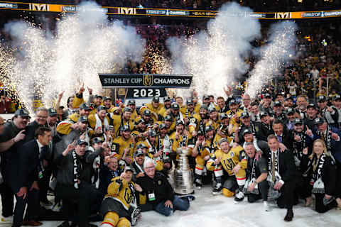 Jun 13, 2023; Las Vegas, Nevada, USA; The Vegas Golden Knights pose with the Stanley Cup after defeating the Florida Panthers in game five of the 2023 Stanley Cup Final at T-Mobile Arena. Mandatory Credit: Stephen R. Sylvanie-USA TODAY Sports