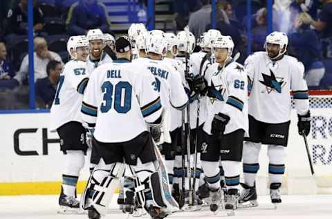 Nov 12, 2016; Tampa, FL, USA; San Jose Sharks right wing Kevin Labanc (62) and teammates congratulate each other after they beat the Tampa Bay Lightning at Amalie Arena. San Jose Sharks defeated the Tampa Bay Lightning 3-1. Mandatory Credit: Kim Klement-USA TODAY Sports