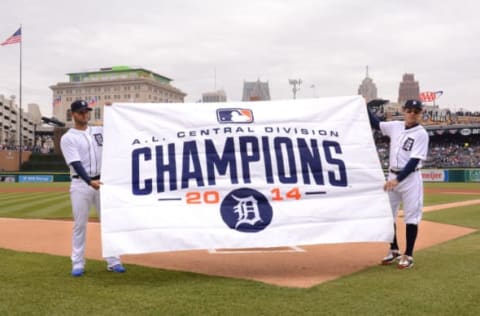 DETROIT, MI – APRIL 06: Anibal Sanchez #19 (L) and Ian Kinsler #3 of the Detroit Tigers hold up the 2014 A.L. Central Division Championship banner prior to the Opening Day game against the Minnesota Twins at Comerica Park on April 6, 2015 in Detroit, Michigan. The Tigers defeated the Twins 4-0. (Photo by Mark Cunningham/MLB Photos via Getty Images)