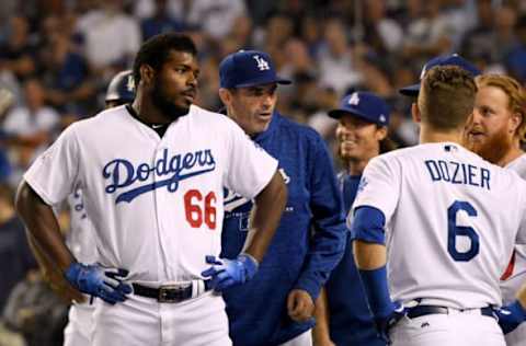 LOS ANGELES, CA – AUGUST 14: Yasiel Puig #66 of the Los Angeles Dodgers reacts after an altercation with Nick Hundley #5 of the San Francisco Giants leading to an ejection for both players during the seventh inning at Dodger Stadium on August 14, 2018 in Los Angeles, California. (Photo by Harry How/Getty Images)