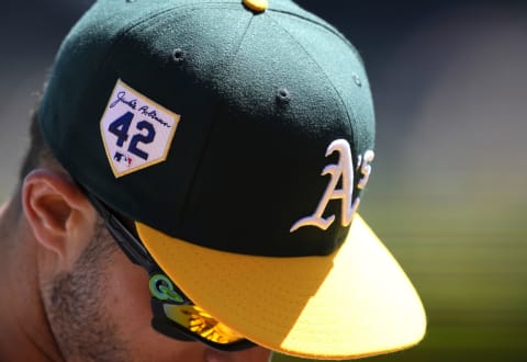 OAKLAND, CALIFORNIA – APRIL 15: A detailed view of the baseball patch on the side of baseball caps worn by players honoring the late Jackie Robinson during a major league baseball game between the New York Mets and Oakland Athletics at RingCentral Coliseum on April 15, 2023 in Oakland, California. All players are wearing the number 42 in honor of Jackie Robinson Day. (Photo by Thearon W. Henderson/Getty Images)