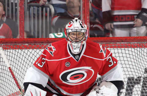 RALEIGH, NC – MARCH 31:Brian Boucher #33 of the Carolina Hurricanes squares himself in the crease to protect the net against the New Jersey Devils during an NHL game on March 31, 2012 at PNC Arena in Raleigh, North Carolina. (Photo by Gregg Forwerck/NHLI via Getty Images)