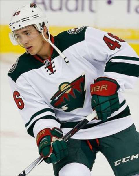 Feb 27, 2014; Edmonton, Alberta, CAN; Minnesota Wild defenseman Jared Spurgeon (46) skates against the Edmonton Oilers at Rexall Place. Mandatory Credit: Perry Nelson-USA TODAY Sports