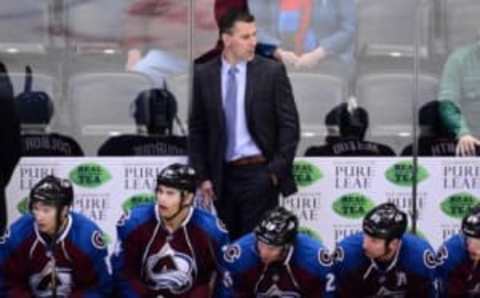 Oct 4, 2016; Denver, CO, USA; Colorado Avalanche head coach Jared Bednar looks on from behind the bench during the third period during a preseason hockey game against Minnesota Wild at the Pepsi Center. The Avalanche defeated the Wild 2-0.Mandatory Credit: Ron Chenoy-USA TODAY Sports