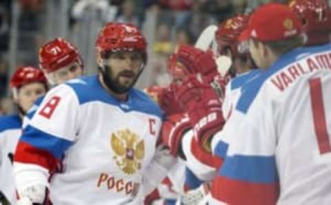 Sep 14, 2016; Pittsburgh, PA, USA;Team Russia center Alex Ovechkin (8) celebrates with the bench after scoring a goal against Team Canada during the third period in a World Cup of Hockey pre-tournament game at CONSOL Energy Center. Team Canada won 3-2 in overtime. Mandatory Credit: Charles LeClaire-USA TODAY Sports