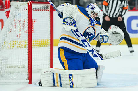 Apr 6, 2023; Detroit, Michigan, USA; Buffalo Sabres goaltender Devon Levi (27) makes a save during the second period against the Detroit Red Wings at Little Caesars Arena. Mandatory Credit: Tim Fuller-USA TODAY Sports