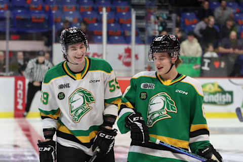 Flyers prospects Denver Barkey and Oliver Bonk sharing a laugh before the CHL Top Prospects game. (Photo by Dennis Pajot/Getty Images)