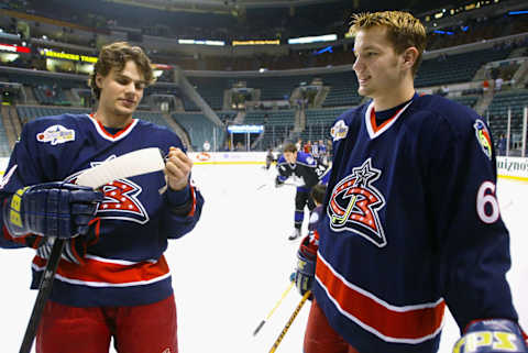 SUNRISE, FL – FEBRUARY 1: Teammates Rostislav Klesla #44 and Rick Nash #61 of the Columbus Blue Jackets enjoy a light moment prior to playing on the Western Conference team in the Topps YoungStars Game, part of 2003 NHL All-Star Weekend presented by Nextel, at the Office Depot Center on February 1, 2003 in Sunrise, Florida. The East went on to defeat the West 8-3. (Photo by Jamie Squire/Getty Images/NHLI)