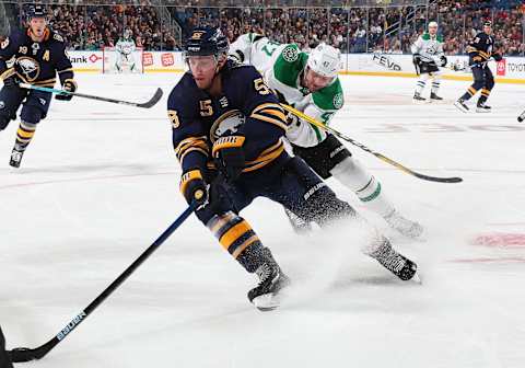 BUFFALO, NY – OCTOBER 14: Rasmus Ristolainen #55 of the Buffalo Sabres controls the puck against Alexander Radulov #47 of the Dallas Stars during an NHL game on October 14, 2019 at KeyBank Center in Buffalo, New York. (Photo by Bill Wippert/NHLI via Getty Images)