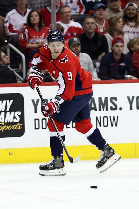 WASHINGTON, DC – APRIL 13: Dmitry Orlov #9 of the Washington Capitals skates with puck against the Carolina Hurricanes in Game Two of the Eastern Conference First Round during the 2019 NHL Stanley Cup Playoffs at Capital One Arena on April 13, 2019 in Washington, DC. (Photo by Rob Carr/Getty Images)