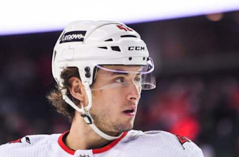 CALGARY, AB – DECEMBER 9: Max Lajoie #42 of the Calgary Flames in action against the Carolina Hurricanes during an NHL game at Scotiabank Saddledome on December 9, 2021, in Calgary, Alberta, Canada. (Photo by Derek Leung/Getty Images)