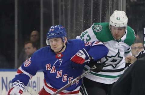 NEW YORK, NEW YORK – NOVEMBER 19: Lias Andersson #50 of the New York Rangers skates against Valeri Nichushkin #43 of the Dallas Stars at Madison Square Garden on November 19, 2018 in New York City. The Rangers defeated the Stars 2-1. (Photo by Bruce Bennett/Getty Images)