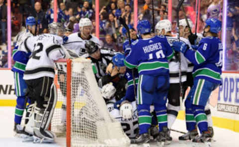 VANCOUVER, BC – MARCH 28: Vancouver Canucks Defenceman Luke Schenn (2) takes Los Angeles Kings Right Wing Trevor Lewis (22) to the ice during their NHL game at Rogers Arena on March 28, 2019 in Vancouver, British Columbia, Canada. (Photo by Derek Cain/Icon Sportswire via Getty Images)