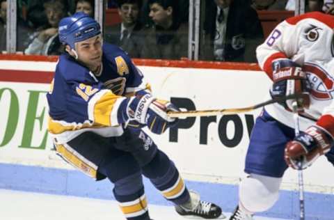 MONTREAL 1990’s: Adam Oates #12 of the St. Louis Blues skates against the Montreal Canadiens in the early 1990’s at the Montreal Forum in Montreal, Quebec, Canada. (Photo by Denis Brodeur/NHLI via Getty Images)