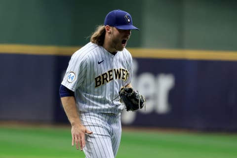 MILWAUKEE, WISCONSIN – SEPTEMBER 18: Corbin Burnes #39 of the Milwaukee Brewers walks off the field in the game against the Chicago Cubs at American Family Field on September 18, 2021 in Milwaukee, Wisconsin. (Photo by Justin Casterline/Getty Images)