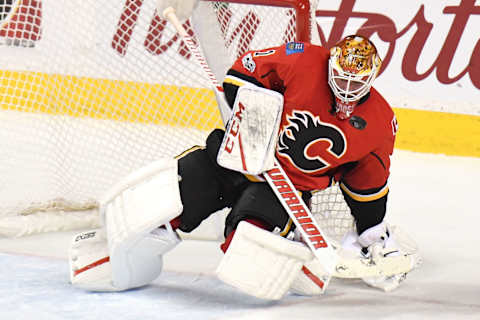 Mar 3, 2017; Calgary, Alberta, CAN; Calgary Flames goalie Brian Elliot (1) stops a shot by the Detroit Red Wings in overtime at Scotiabank Saddledome. The Flames won 3-2 in overtime. Mandatory Credit: Candice Ward-USA TODAY Sports