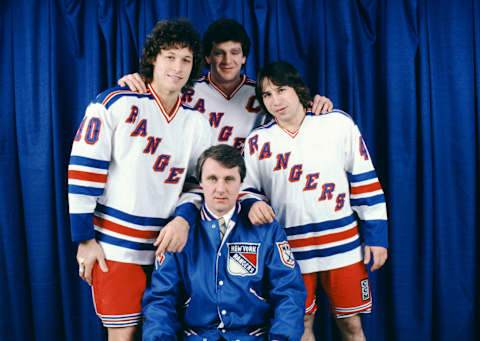 NEW YORK, NY – DECEMBER, 1981: Ron Duguay #10, Barry Beck #3, Mark Pavelich #40 and head coach Herb Brooks pose for a portrait before an NHL game circa December, 1981 at the Madison Square Garden in New York, New York. (Photo by Bruce Bennett Studios/Getty Images)