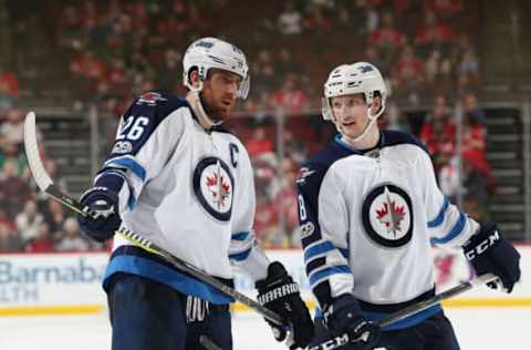 NEWARK, NJ – MARCH 28: Blake Wheeler #26 and Jacob Trouba #8 of the Winnipeg Jets talk as they wait for a face-off during the game against the New Jersey Devils on March 28, 2017, at the Prudential Center in Newark, New Jersey. (Photo by Christopher Pasatieri/Getty Images)