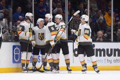 UNIONDALE, NY – DECEMBER 05: The Vegas Golden Knights celebrate Vegas Golden Knights Right Wing Alex Tuch’s (89) goal during the second period of the National Hockey League game between the Las Vegas Golden Knights and the New York Islanders on December 5, 2019, at the Nassau Veterans Memorial Coliseum in Uniondale, NY. (Photo by Gregory Fisher/Icon Sportswire via Getty Images)