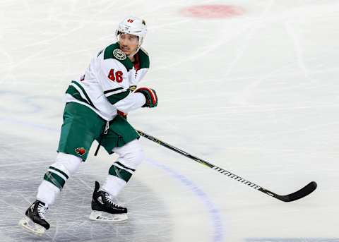 WINNIPEG, MB – APRIL 20: Jared Spurgeon #46 of the Minnesota Wild keeps an eye on the play during second period action against the Winnipeg Jets in Game Five of the Western Conference First Round during the 2018 NHL Stanley Cup Playoffs at the Bell MTS Place on April 20, 2018 in Winnipeg, Manitoba, Canada. The Jets defeated the Wild 5-0 and won the series 4-1. (Photo by Jonathan Kozub/NHLI via Getty Images)