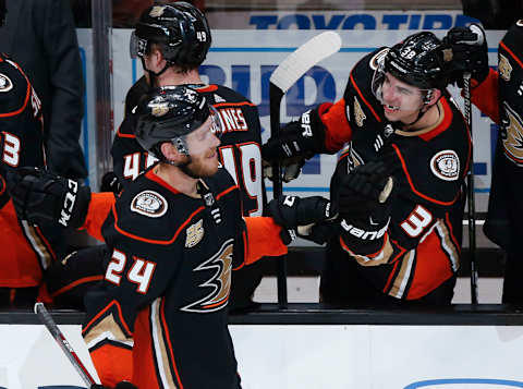 ANAHEIM, CA – FEBRUARY 27: Carter Rowney #24 of the Anaheim Ducks celebrates with Derek Grant #38 on the bench after scoring a second-period goal against the Chicago Blackhawks during the game at Honda Center on February 27, 2019, in Anaheim, California. (Photo by Debora Robinson/NHLI via Getty Images)