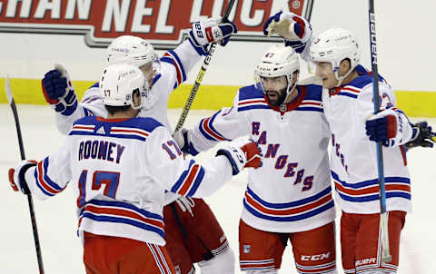 Jan 24, 2021; Pittsburgh, Pennsylvania, USA; The New York Rangers celebrate a goal by winger Colin Blackwell (43) against the Pittsburgh Penguins during the first period at the PPG Paints Arena. Mandatory Credit: Charles LeClaire-USA TODAY Sports