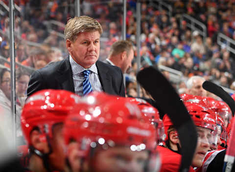 EDMONTON, AB – SEPTEMBER 25: Bill Peters of the Carolina Hurricanes watches play from the bench during the preseason game against the Edmonton Oilers on September 25, 2017 at Rogers Place in Edmonton, Alberta, Canada. (Photo by Andy Devlin/NHLI via Getty Images)