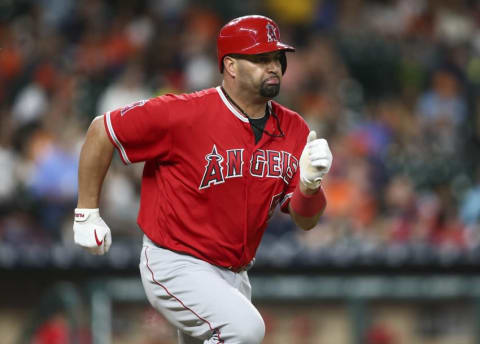 Los Angeles Angels designated hitter Albert Pujols (5) runs on a double. Mandatory Credit: Troy Taormina-USA TODAY Sports