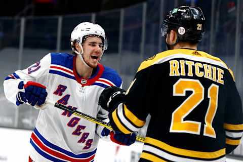 Brett Howden #21 of the New York Rangers shoves Nick Ritchie #21 of the Boston Bruins . (Photo by Maddie Meyer/Getty Images)