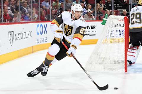 GLENDALE, ARIZONA – OCTOBER 10: Shea Theodore #27 of the Vegas Golden Knights skates the puck up ice against the Arizona Coyotes at Gila River Arena on October 10, 2019 in Glendale, Arizona. (Photo by Norm Hall/NHLI via Getty Images)