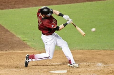 Aug 17, 2016; Phoenix, AZ, USA; Arizona Diamondbacks left fielder Mitch Hanniger (19) singles during the sixth inning against the New York Mets at Chase Field. Mandatory Credit: Matt Kartozian-USA TODAY Sports