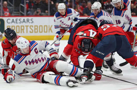 WASHINGTON, DC – FEBRUARY 25: Jacob Trouba #8 of the New York Rangers falls to the ice against the Washington Capitals during the third period at Capital One Arena on February 25, 2023, in Washington, DC. (Photo by Patrick Smith/Getty Images)