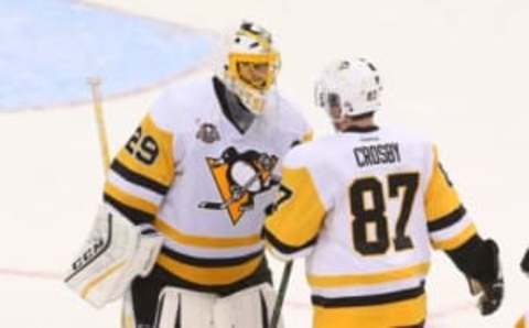 NHL Power Rankings: Pittsburgh Penguins goalie Marc-Andre Fleury (29) and center Sidney Crosby (87) celebrate their 5-2 win over the New Jersey Devils at Prudential Center. Mandatory Credit: Ed Mulholland-USA TODAY Sports