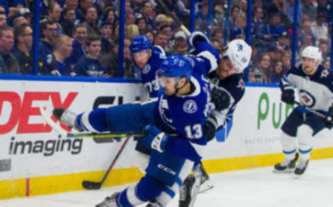 oTAMPA, FL – MARCH 5: Cedric Paquette #13 of the Tampa Bay Lightning is thrown to the ice by Blake Wheeler #26 of the Winnipeg Jets during the third period at Amalie Arena on March 5, 2019 in Tampa, Florida. (Photo by Scott Audette/NHLI via Getty Images)