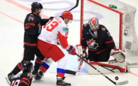 OSTRAVA, CZECH REPUBLIC – JANUARY 5, 2020: Canada’s Nolan Foote (L front), Ty Smith (L back), goaltender Joel Hofer (R), and Russia’s Yegor Sokolov (C) in the 2020 World Junior Ice Hockey Championship final match between Canada and Russia at Ostravar Arena. Peter Kovalev/TASS (Photo by Peter KovalevTASS via Getty Images)