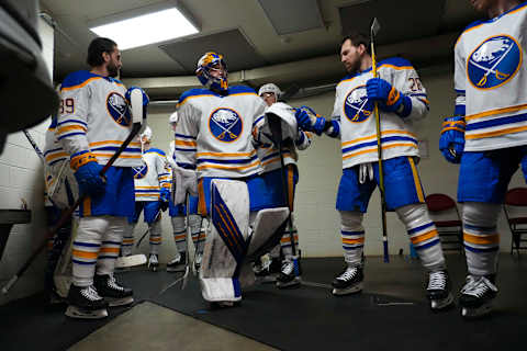 Apr 7, 2022; Raleigh, North Carolina, USA; Buffalo Sabres goaltender Craig Anderson (41) comes out of the locker room past left wing Zemgus Girgensons (28) and right wing Alex Tuch (89) against the Carolina Hurricanes before the game at PNC Arena. Mandatory Credit: James Guillory-USA TODAY Sports