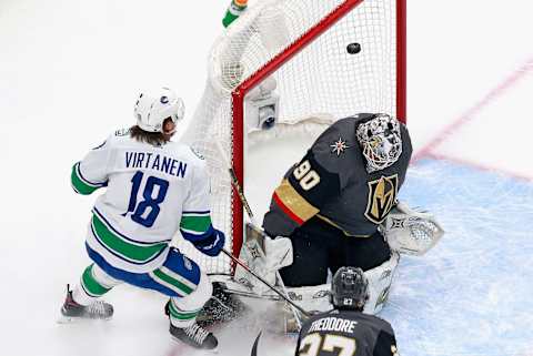 EDMONTON, ALBERTA – AUGUST 23: Jake Virtanen #18 of the Vancouver Canucks watches a first period shot miss the net against Robin Lehner #90 of the Vegas Golden Knights in Game One of the Western Conference Second Round during the 2020 NHL Stanley Cup Playoffs at Rogers Place on August 23, 2020 in Edmonton, Alberta, Canada. (Photo by Jeff Vinnick/Getty Images)