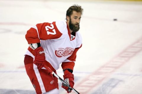 Apr 2, 2016; Toronto, Ontario, CAN; Detroit Red Wings defenseman Kyle Quincey (27) warms up before playing against the Toronto Maple Leafs at Air Canada Centre. Mandatory Credit: Tom Szczerbowski-USA TODAY Sports