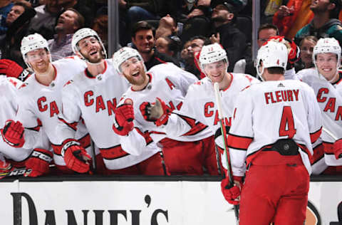 ANAHEIM, CA – OCTOBER 18: Haydn Fleury #4 of the Carolina Hurricanes celebrates his second period goal with his teammates during the game against the Anaheim Ducks at Honda Center on October 18, 2019 in Anaheim, California. (Photo by Robert Binder/NHLI via Getty Images)